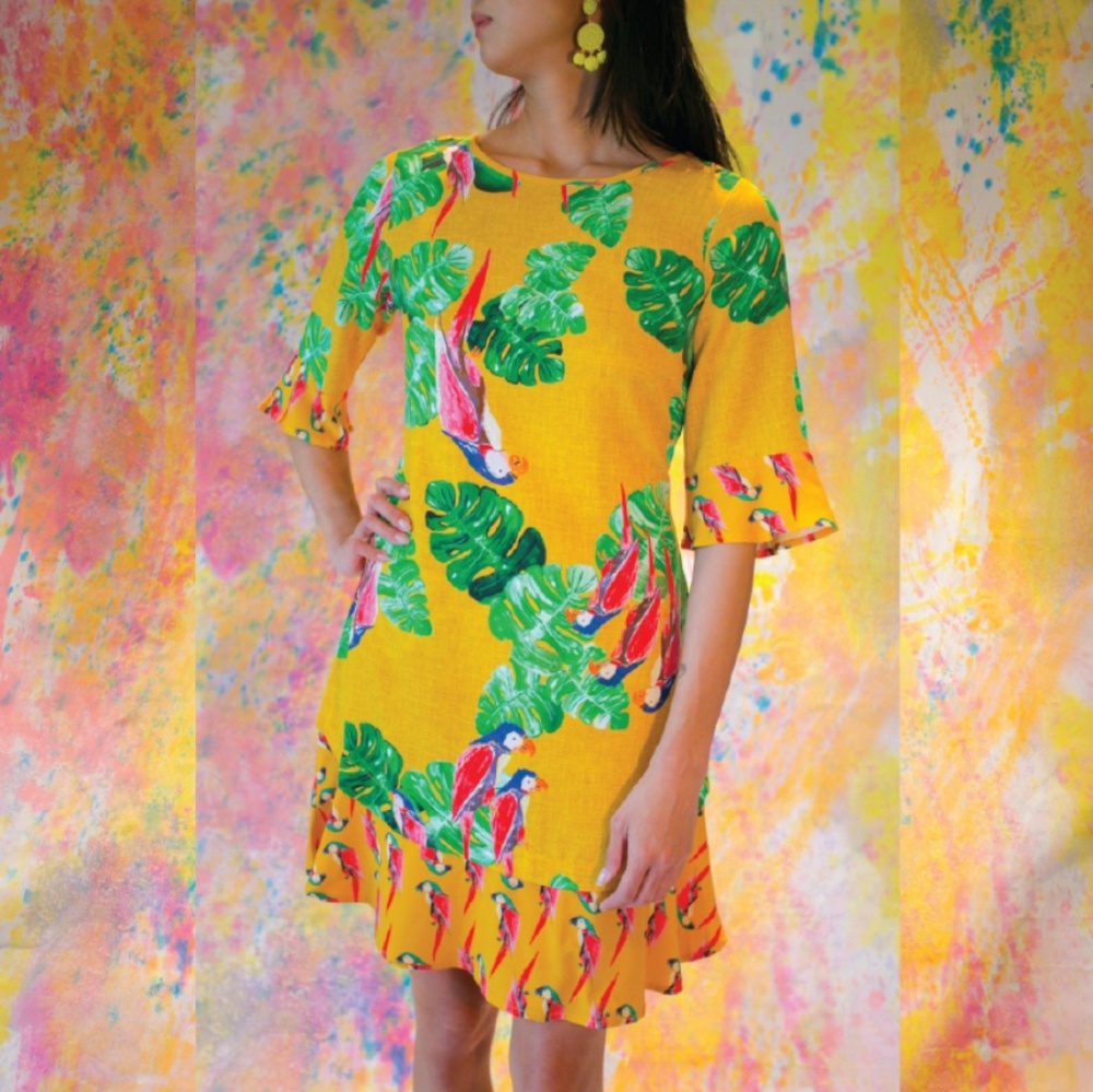 Open back dress with ruffked hem and sleeves